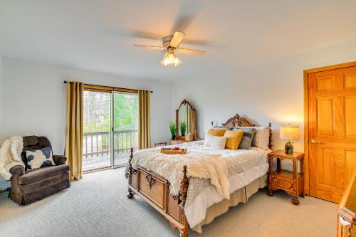 a bedroom with a bed and a ceiling fan at New York Retreat - Furnished Deck and Mountain Views in Lanesville