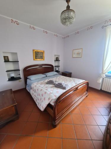 En eller flere senge i et værelse på Le Camarelle by PortofinoVacanze