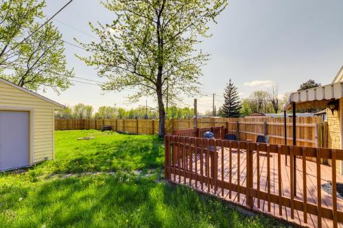 a wooden fence in a yard with a yard at Pet-Friendly Ohio Escape with Deck and Community Dock! in Celina