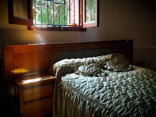 Ένα ή περισσότερα κρεβάτια σε δωμάτιο στο Your Rest