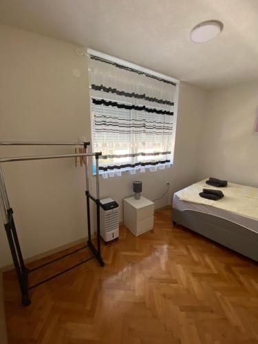 Postel nebo postele na pokoji v ubytování Apartments Graz