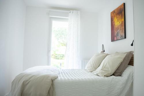 Postel nebo postele na pokoji v ubytování Gîte de Florigny