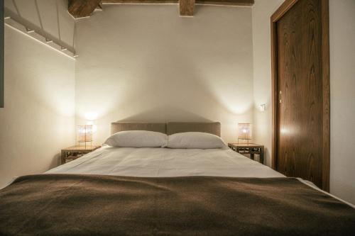 Albergo La Pietraにあるベッド