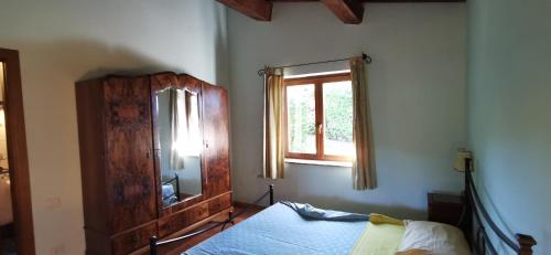 Katil atau katil-katil dalam bilik di Country House Trevi Umbria Borghetto Vetuliae