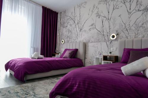 Postel nebo postele na pokoji v ubytování Luxury Apartment in Prishtina