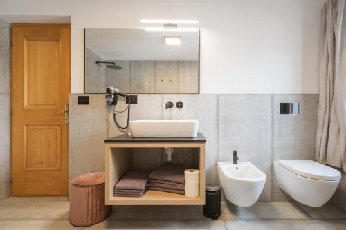 Koupelna v ubytování Apartments Carmen