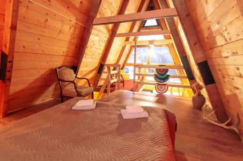 Postel nebo postele na pokoji v ubytování A-frame mestia