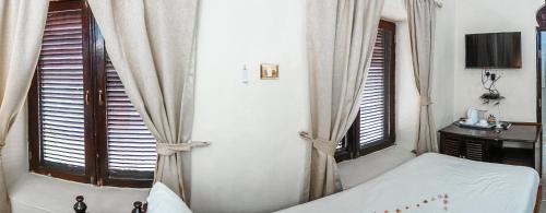 Ένα ή περισσότερα κρεβάτια σε δωμάτιο στο Al Johari Hotel & Spa