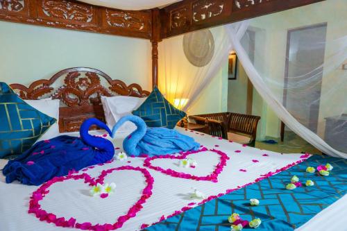 Ένα ή περισσότερα κρεβάτια σε δωμάτιο στο Al Johari Hotel & Spa