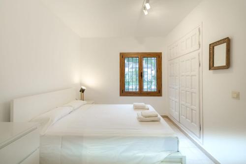Postel nebo postele na pokoji v ubytování Casa La Calma