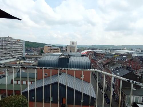 a view of a city from the top of a building at Liège centre Médiacité appartement parking gratuit terrasse immense 8ème pour 2 personnes in Liège