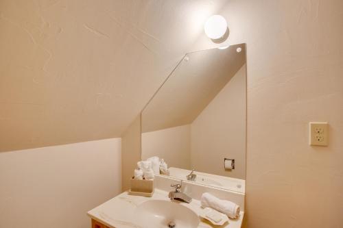 a bathroom with a sink and a mirror at Cozy Dolores Getaway Hike, Fish and More! in Dolores