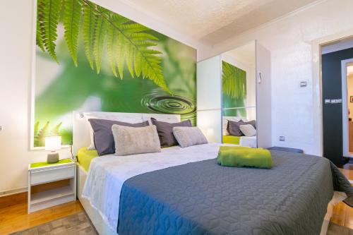Posteľ alebo postele v izbe v ubytovaní Apartments Villa Tomaš