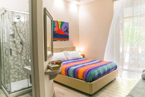 Cama ou camas em um quarto em Napoli Vomero Station rooms