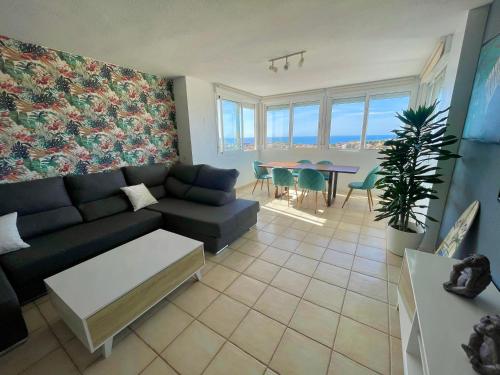 Increíble apartamento San Juan playaにあるシーティングエリア