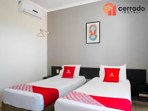 Katil atau katil-katil dalam bilik di Cerrado Hotel LTDA
