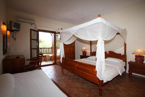 Ένα ή περισσότερα κρεβάτια σε δωμάτιο στο Sun Accommodation