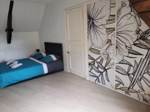 Giường trong phòng chung tại Le Castel - Dormir Comme à La Maison -