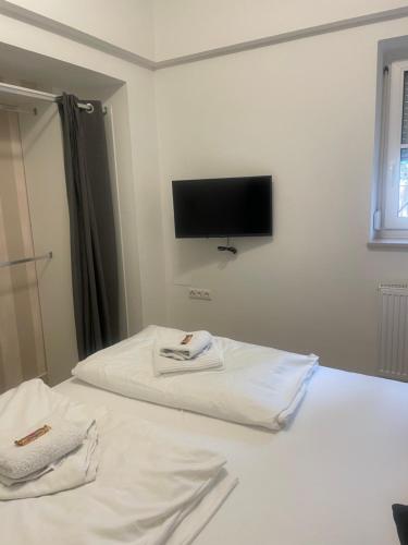 Una cama o camas en una habitación de Suite 2