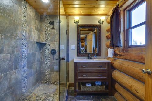 a bathroom with a shower and a sink at Grand Lake Cabin with Direct Access to Rocky Mtn NP! in Grand Lake