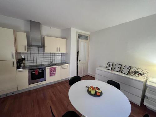 Kuchyň nebo kuchyňský kout v ubytování Logement paisible pour 4 pers.