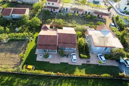 an overhead view of a house with a yard at Villa Agathi in Roda