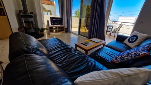 Posezení v ubytování Makry Gialos Grapevines Villa 11 - Makry Gialos