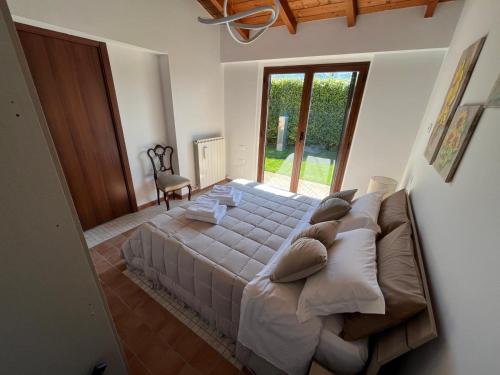 Postel nebo postele na pokoji v ubytování B&B La cas' d'Alfonz'