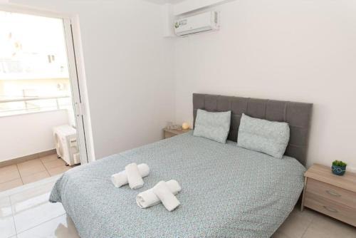 Postel nebo postele na pokoji v ubytování Fully equipped flat in Piraeus (Erm_C7)