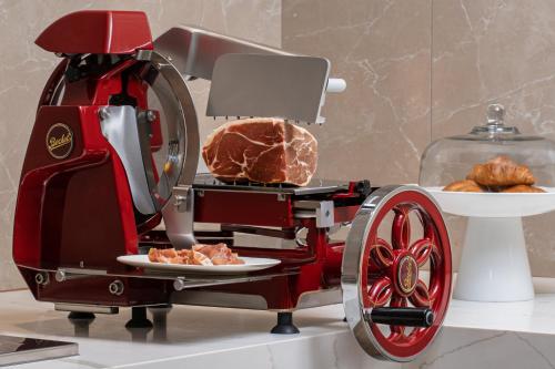 a food machine with a plate of food on a table at AC Hotel by Marriott Fort Lauderdale Sawgrass Mills Sunrise in Sunrise