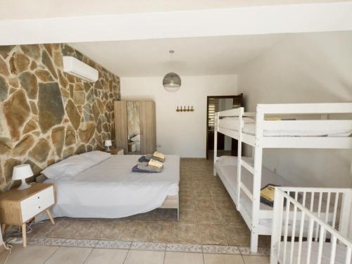 Llit o llits en una habitació de Leo's Paradise