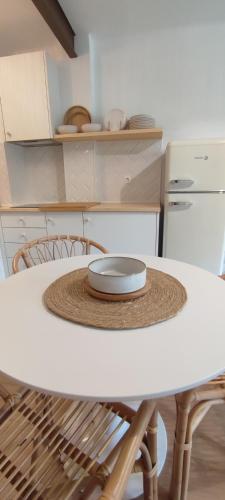 a white table with a plate on top of it at Marina's Calm in Salou