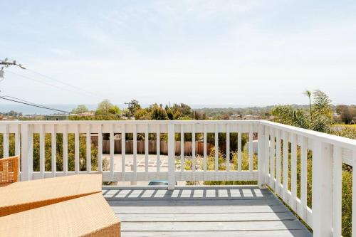 a porch with a white fence and a bench at Malibu Ocean Villa with King Bed, Hot Tub, Beach, BBQ in Malibu