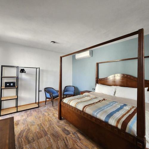 En eller flere senge i et værelse på Amplia Habitación Privada Centro