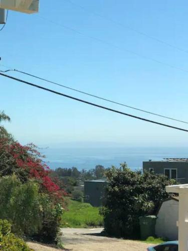 a view of the ocean from a house at 30 PCT OFF! Malibu Romantic Suite, Ocean View, Beach in Malibu