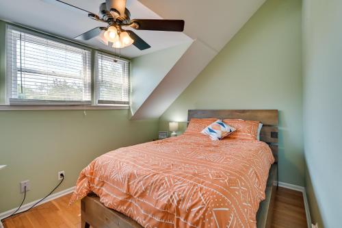 a bedroom with a bed and a ceiling fan at Coastal Vacation Rental - 2 Mi to Huntington Beach in Myrtle Beach