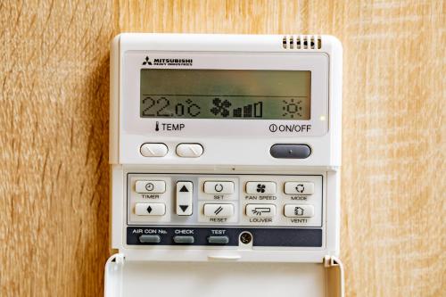 an electronic device is attached to a wall at Apartamentos Villa Zoila Nigrán in Nigrán