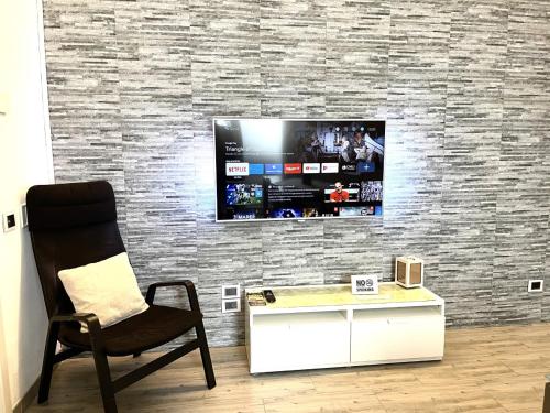 TV i/ili multimedijalni sistem u objektu Apartment Sigaba