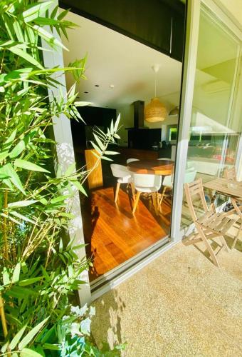 a living room with a table and a dining room at Portugal Holidays Villa in Barcelos