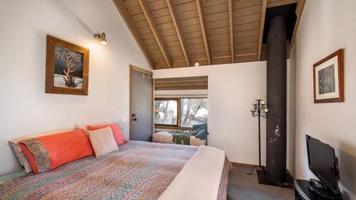 Ένα ή περισσότερα κρεβάτια σε δωμάτιο στο Kunama