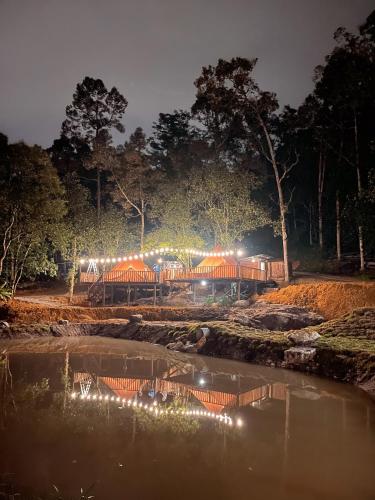 a park with a roller coaster at night at Tingkat Valley in Ipoh