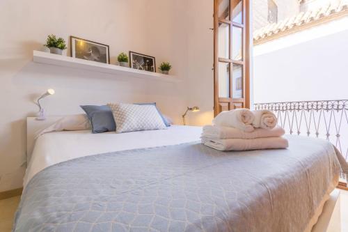 Posteľ alebo postele v izbe v ubytovaní Apartamento Anais Centro Sevilla
