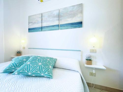 Postel nebo postele na pokoji v ubytování Casa Capo Perla - ArgonautiVacanze