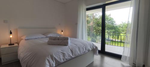 Postel nebo postele na pokoji v ubytování A Casa do Holandês