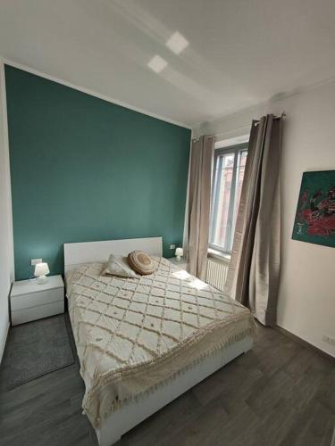 Кровать или кровати в номере Appartamento New: Lingotto