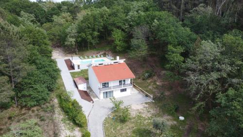an overhead view of a house in the woods at A Casa do Holandês in Vieira do Minho