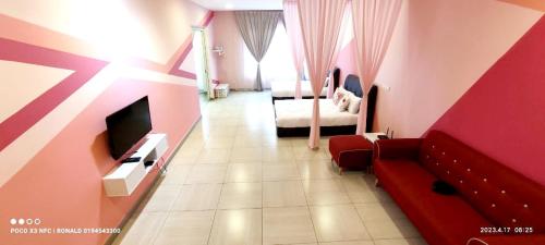 TV a/nebo společenská místnost v ubytování PoP Kitty Octagon Premium Ipoh Town Center 2BR by Grab A Stay