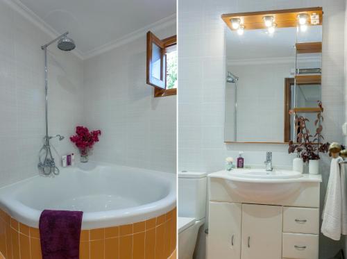 Serra的住宿－VILLA LATEL，带浴缸、水槽和镜子的浴室