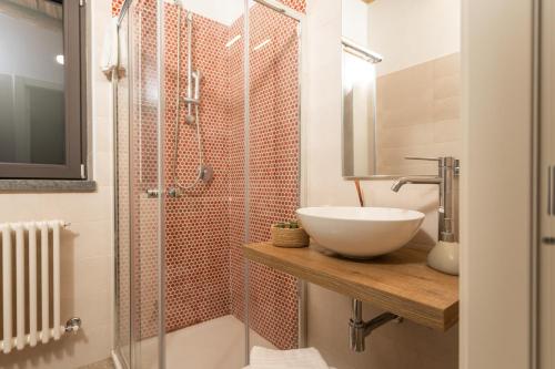 a bathroom with a sink and a shower at i Cacciagalli Wine Resort in Teano