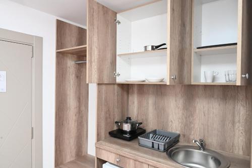 Una cocina o zona de cocina en Dona, Altina